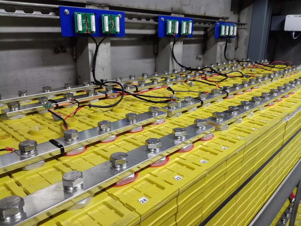 An array of yellow-coloured Lithium iron phosphate solar batterien (solar batteries)